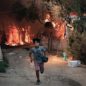 Photo enfant camp de réugiés « Ces flammes doivent nous alerter » : un témoignage depuis les camps en feu migrants Grèce île de Lesbos migrations Libye Covid-19