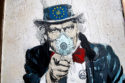 Photo street art masques La deuxième vague à l'échelle pertinente UE lutte contre la pandémie de Covid-19 Union européenne confinement gestion sanitaire mesures restrictives masques admissions en réanimation morts santé publique
